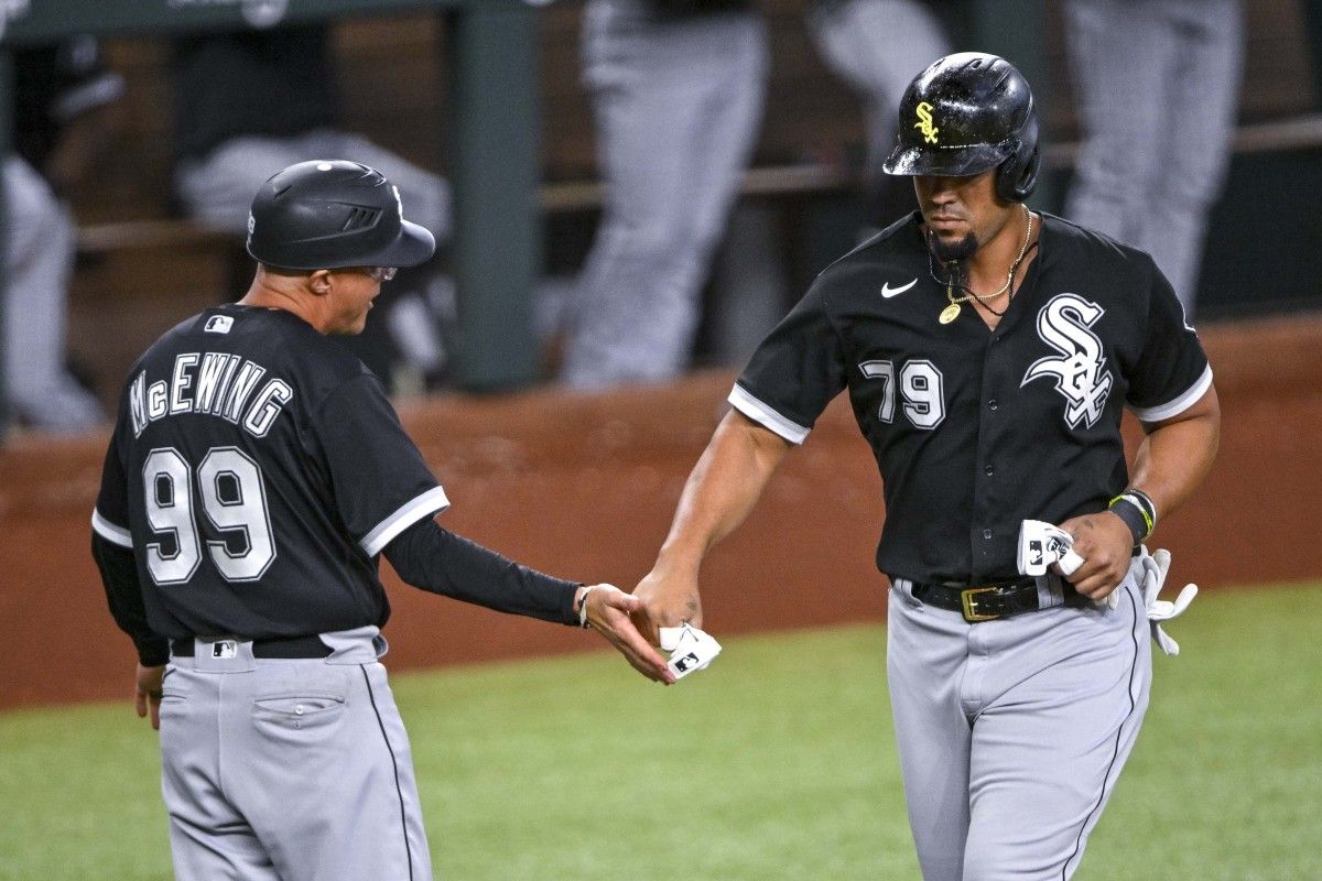Chicago White Sox designated hitter Jose Abreu (79) rounds third base past third base coach Joe McEwing (99) during the third inning against the Texas Rangers at Globe Life Field. (Jerome Miron-USA TODAY Sports)