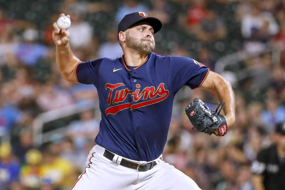 Minnesota Twins relief pitcher Michael Fulmer throws to a Toronto Blue Jays batter during the 10th inning of a baseball game Friday, Aug. 5, 2022, in Minneapolis. The Twins won 6-5 in 10 innings.