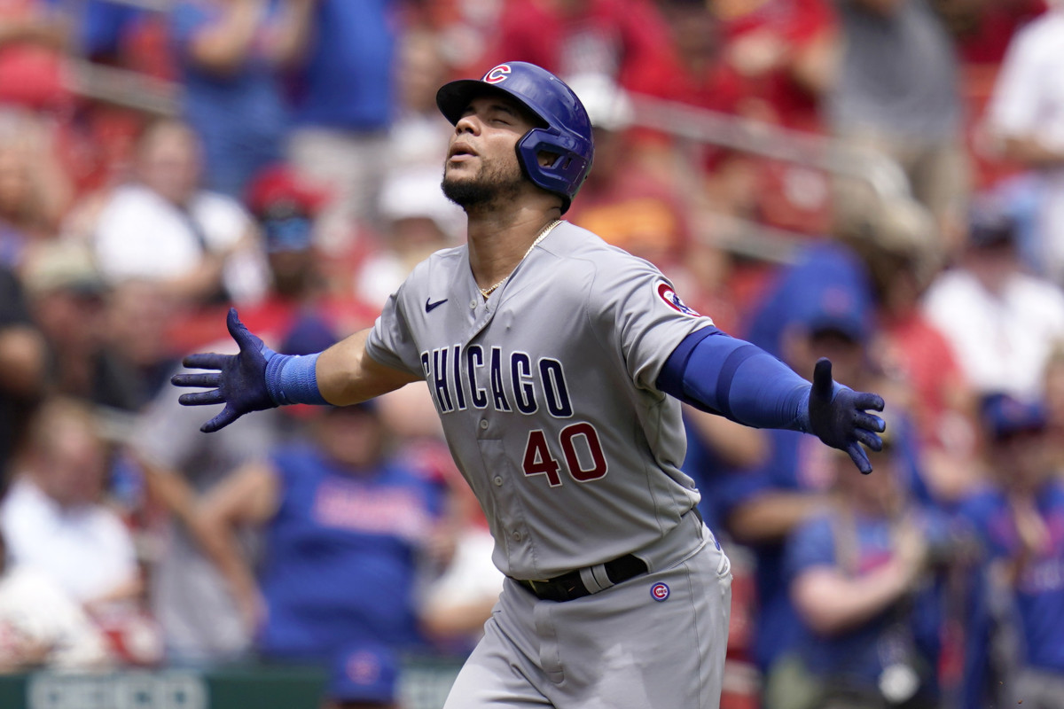 Chicago Cubs’ Willson Contreras celebrates after hitting a solo home run during the first inning in the first game of a baseball doubleheader against the St. Louis Cardinals Thursday, Aug. 4, 2022, in St. Louis.