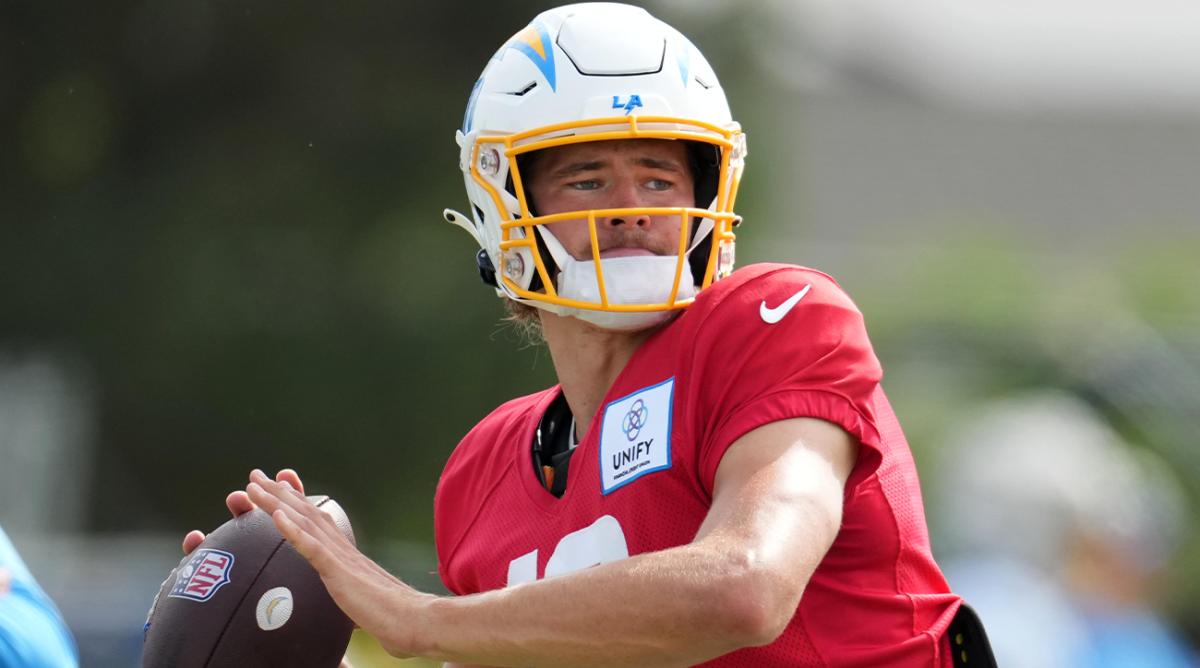 Aug 1, 2022; Costa Mesa, CA, USA; Los Angeles Chargers quarterback Justin Herbert (10) throws the ball during training camp at the Jack Hammett Sports Complex.