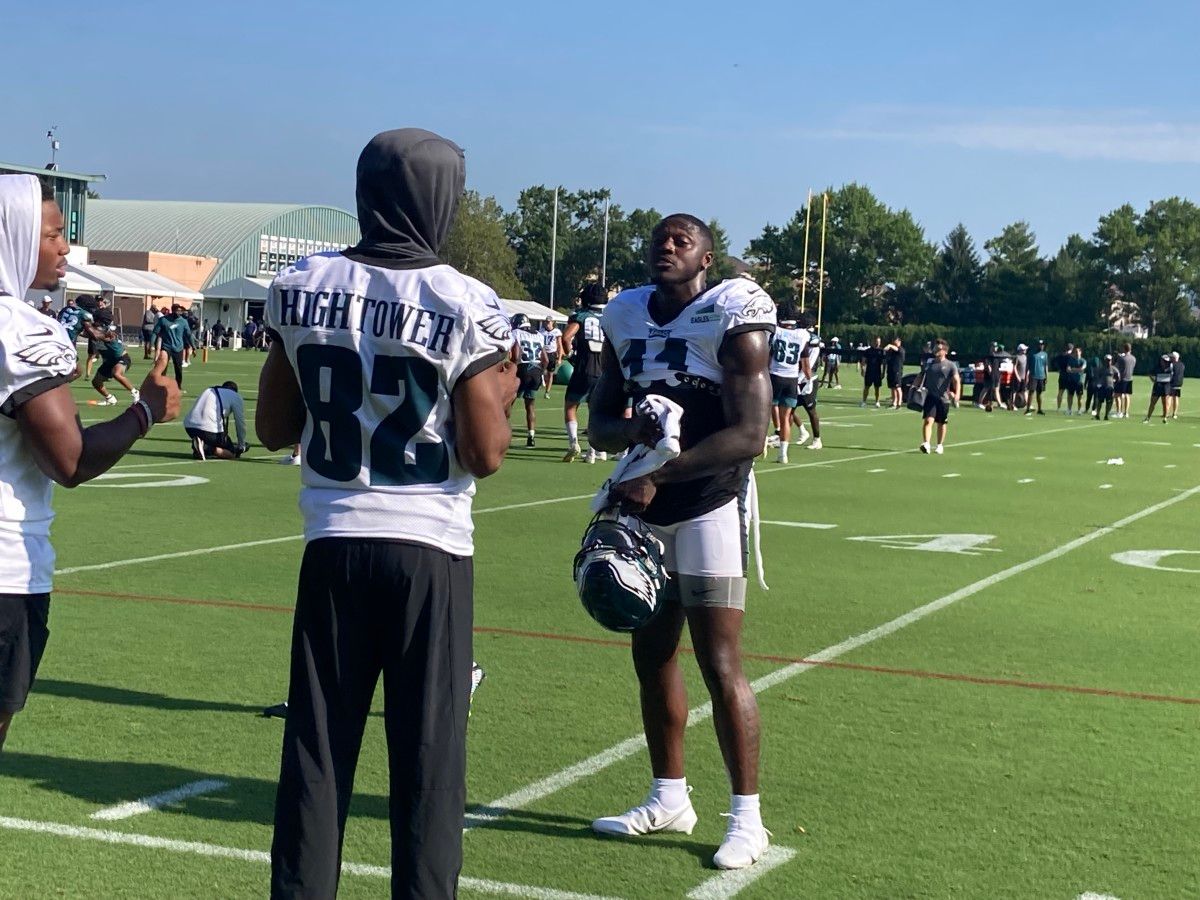 A.J. Brown talks to injured WRs Greg Ward (left) and John Hightower prior to Day 9 of training camp