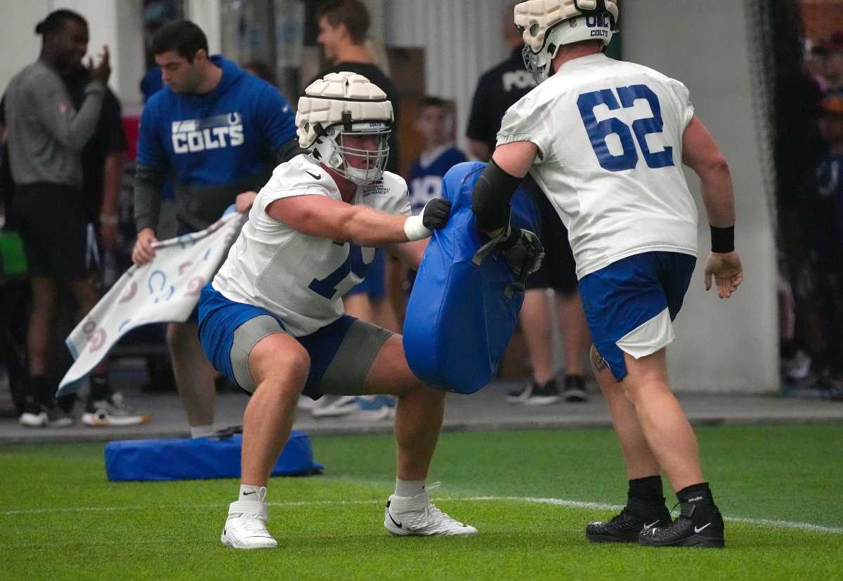Indianapolis Colts tackle Bernhard Raimann (79) and center Wesley French (62) run through a drill during training camp Wednesday, July 27, 2022, at Grand Park Sports Campus in Westfield, Ind. Indianapolis Colts Training Camp Nfl Wednesday July 27 2022 At Grand Park Sports Campus In Westfield Ind