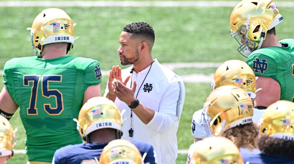 Apr 23, 2022; Notre Dame, Indiana, USA; Notre Dame Fighting Irish head coach Marcus Freeman watches warmups before the Blue-Gold Game at Notre Dame Stadium.