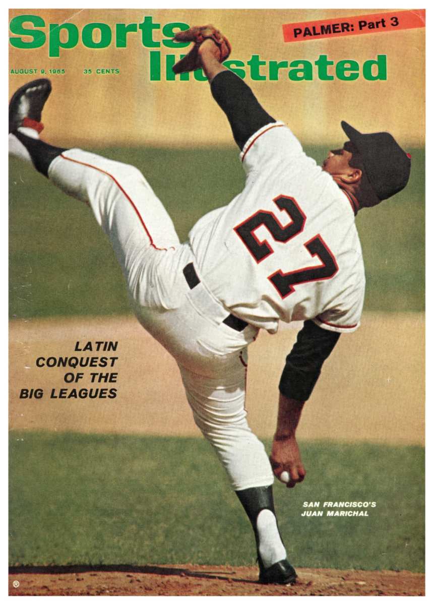 Sports Illustrated cover featuring Juan Marichal winding up to deliver a pitch