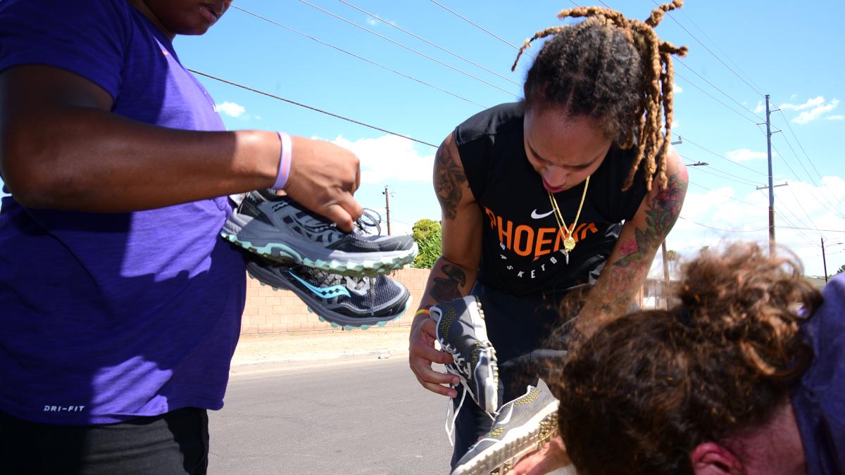 Phoenix Mercury center Brittney Griner participates in a shoe drive with the Phoenix Rescue Mission.