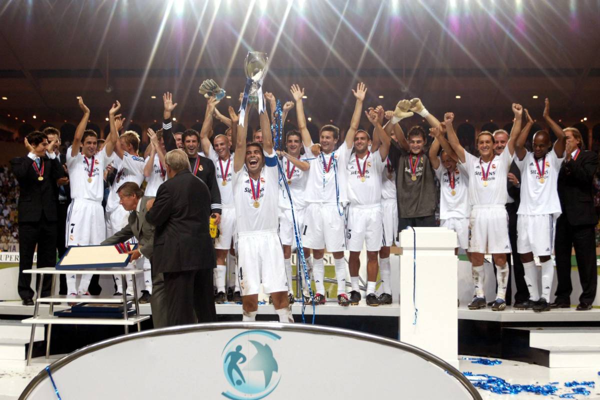 Real Madrid's players pictured celebrating after winning the UEFA Super Cup in 2002
