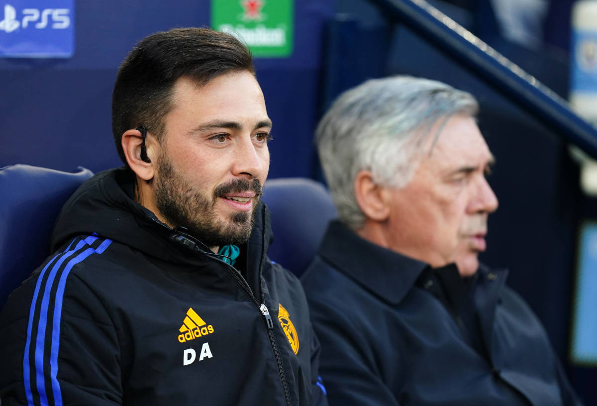 Davide Ancelotti pictured (left) alongside his father Carlo in the Real Madrid dugout in April 2022