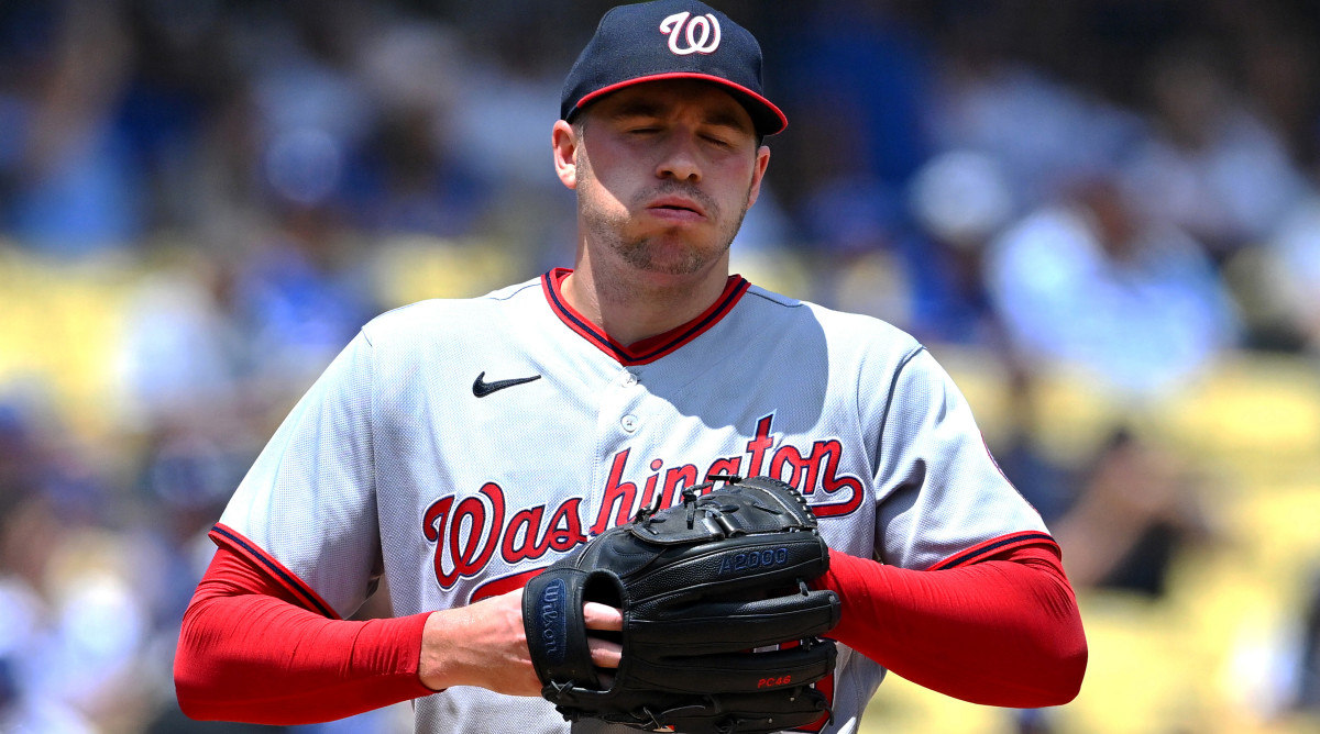 Jul 27, 2022; Los Angeles, California, USA; Washington Nationals starting pitcher Patrick Corbin (46) closes his eyes and takes a breath after giving up his fourth run of the first inning against the Los Angeles Dodgers at Dodger Stadium.