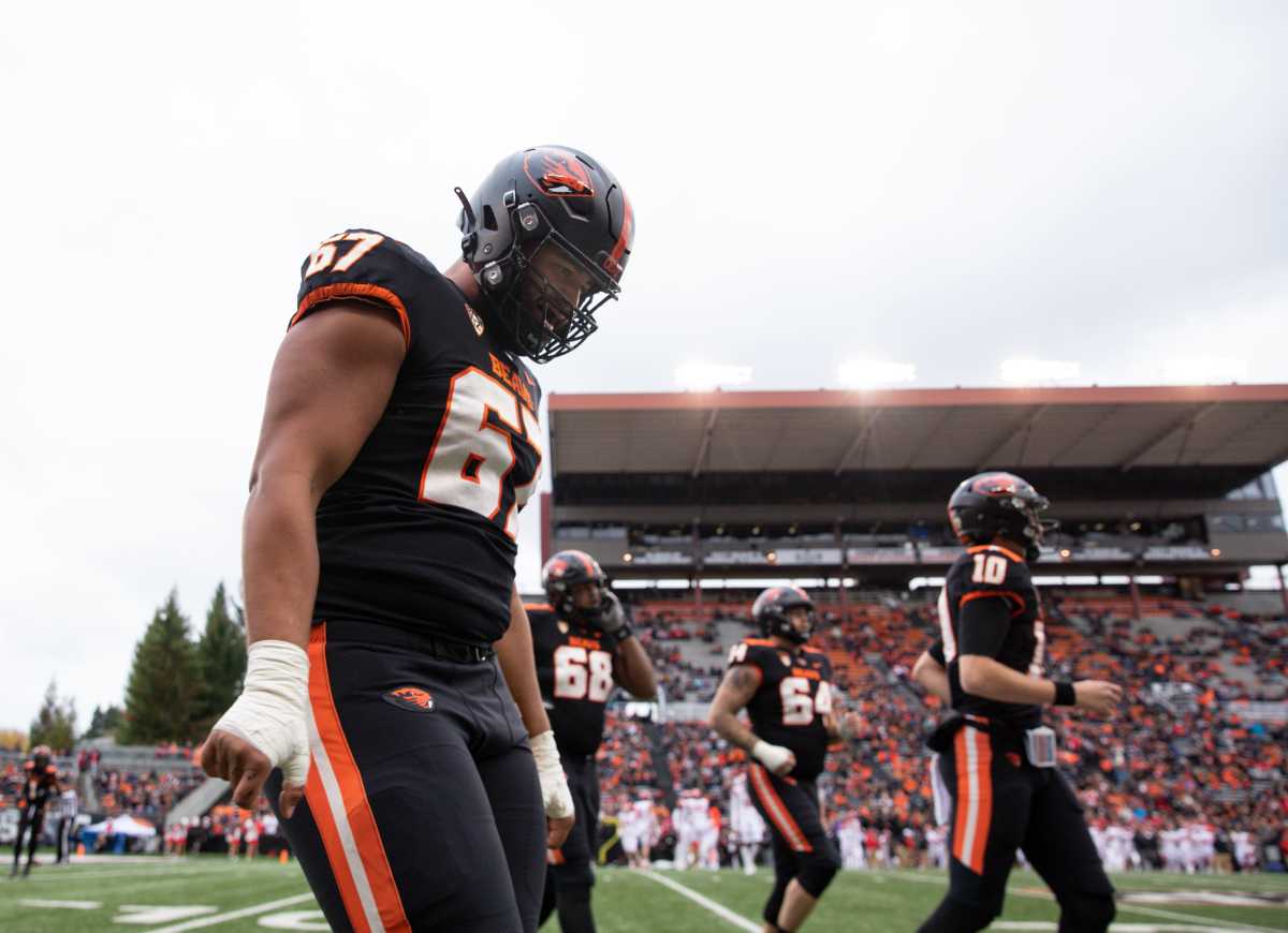 Oregon State offensive lineman Joshua Gray (67) walks off the field during the first quarter of the game at Oregon State University in Corvallis, Oregon on Saturday.