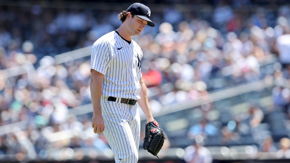 Gerrit Cole reacts after giving up a home run