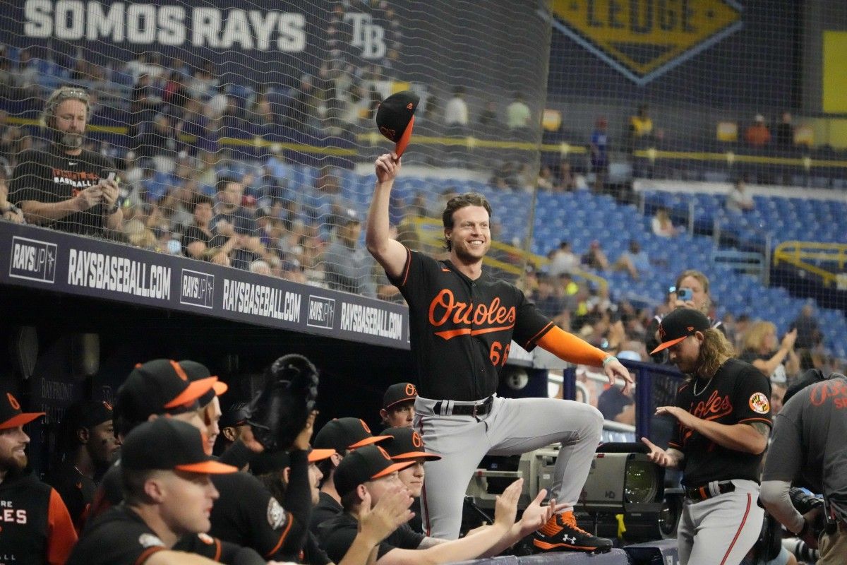 Brett Phillips waves to the Tropicana Field crowd after watching a ''thank you'' video that the Rays played during the third inning. (USA TODAY Sports)
