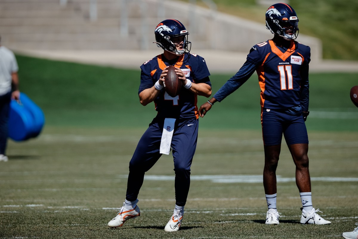 Denver Broncos quarterback Brett Rypien (4) and quarterback Josh Johnson (11) during training camp at the UCHealth Training Center.