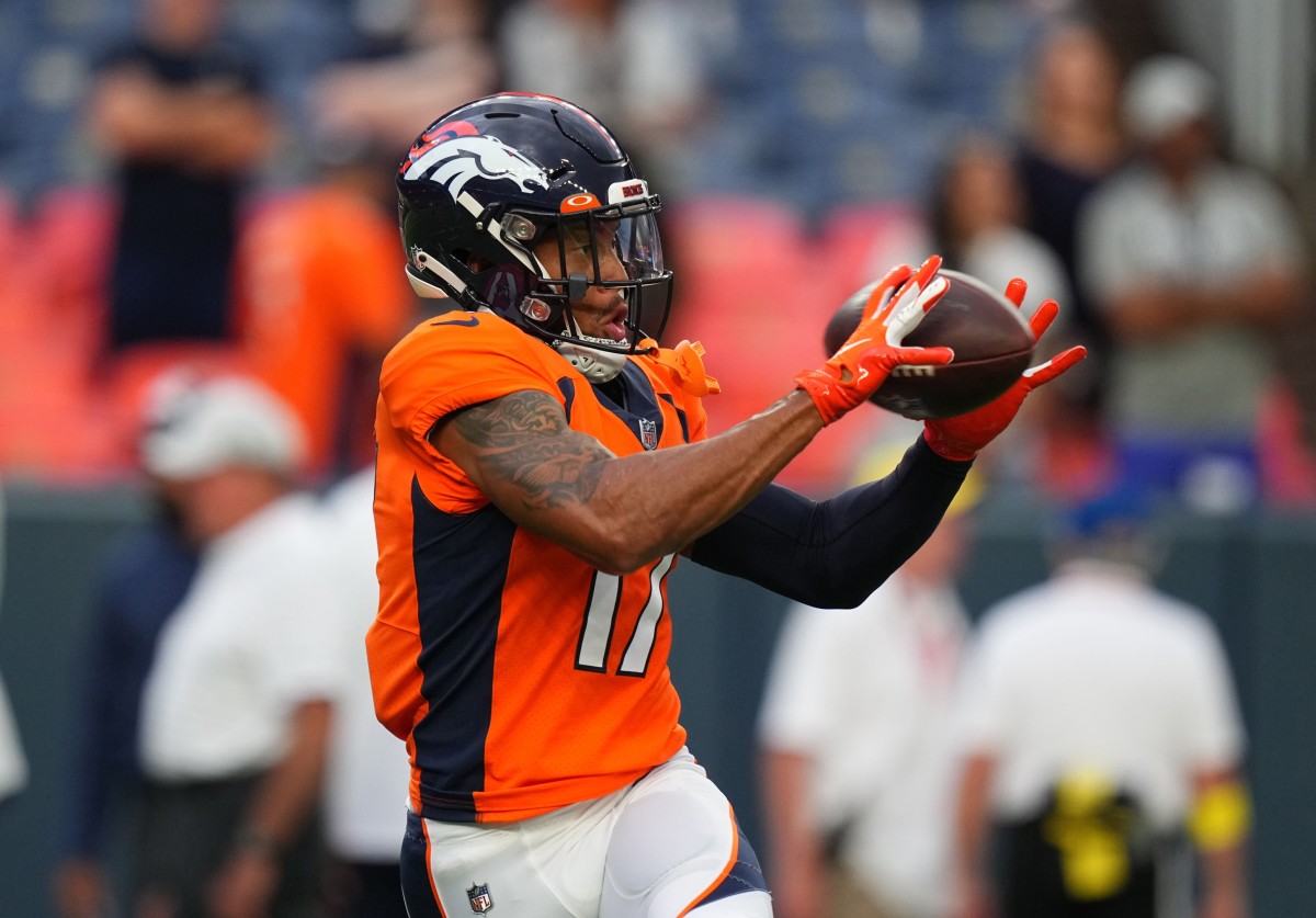 Denver Broncos wide receiver Jalen Virgil (17) warms up before the preseason game against the Dallas Cowboys at Empower Field at Mile High.