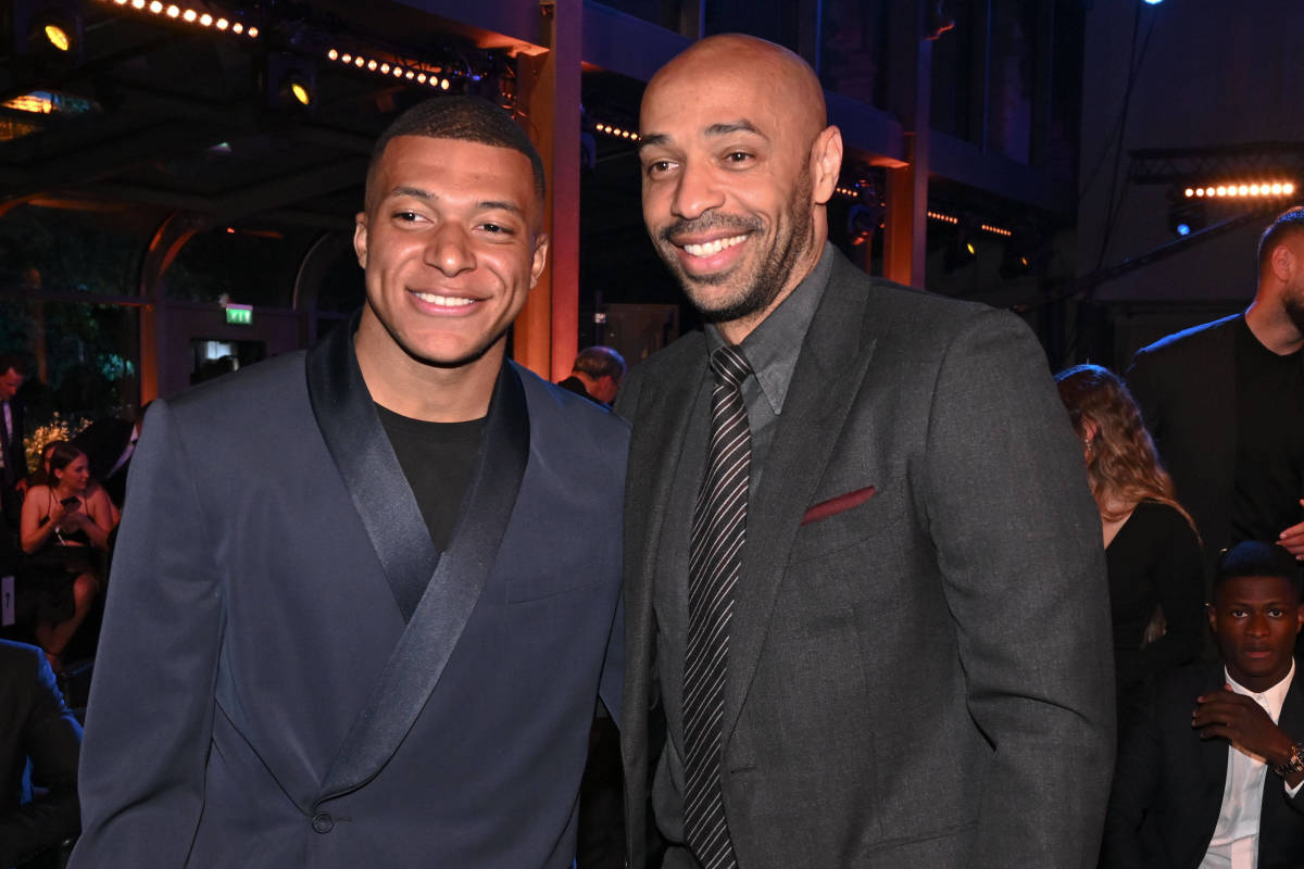 Kylian Mbappe (left) and Thierry Henry pictured at an awards ceremony in May 2022
