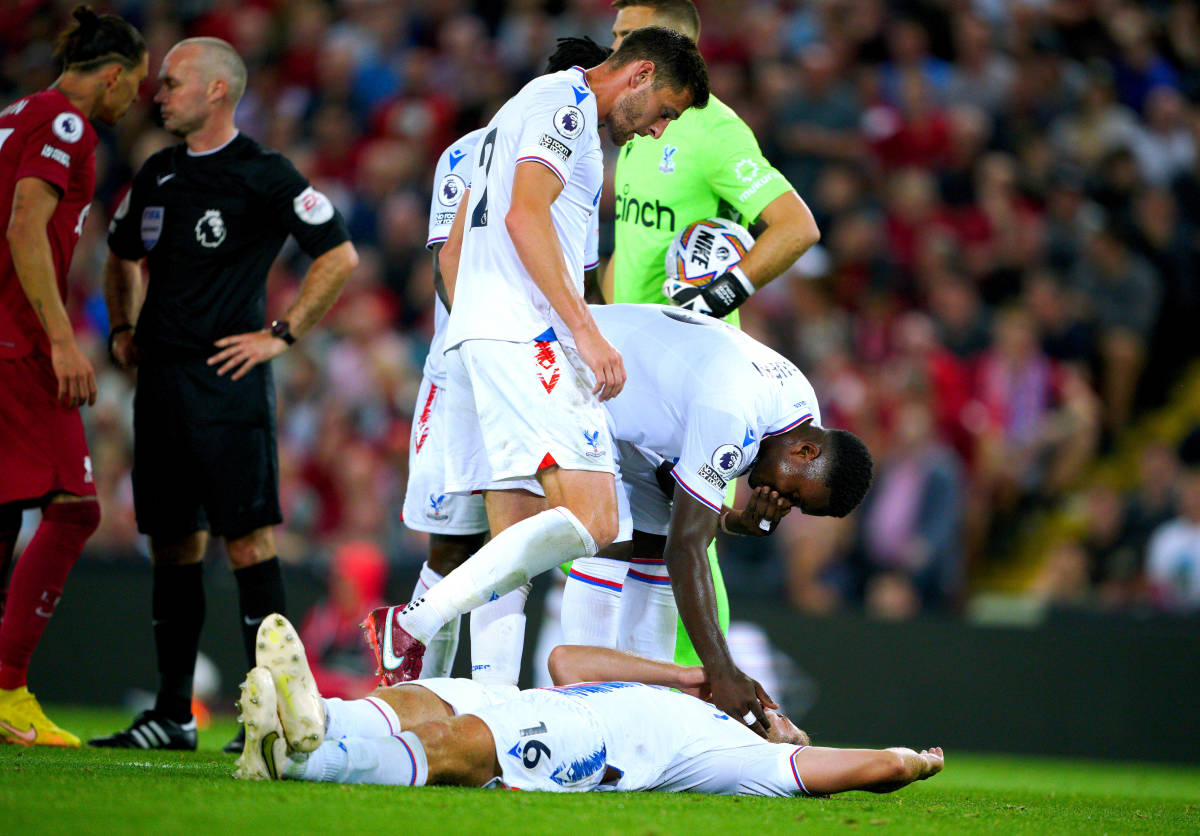 Joachim Andersen pictured laying on the ground after being head-butted by Darwin Nunez (top left)