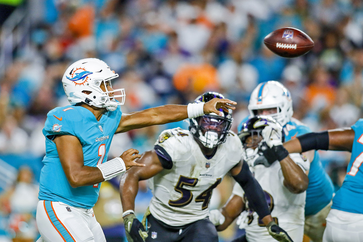 Tua Tagovailoa releases a pass against the Ravens during a 2021 game.