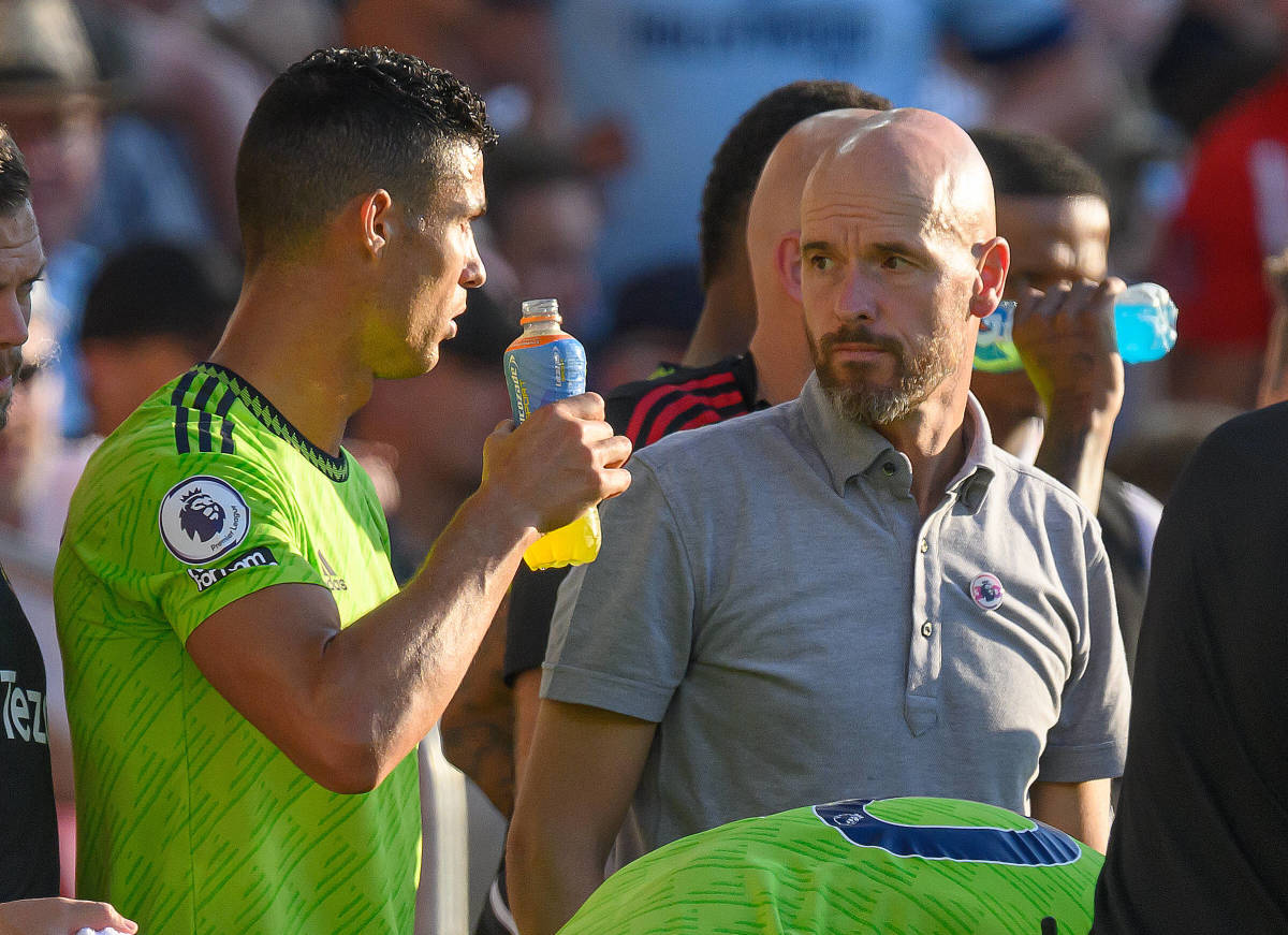 Erik ten Hag (right) and Cristiano Ronaldo pictured glaring at each other during a drinks break in Manchester United's 4-0 defeat at Brentford in August 2022