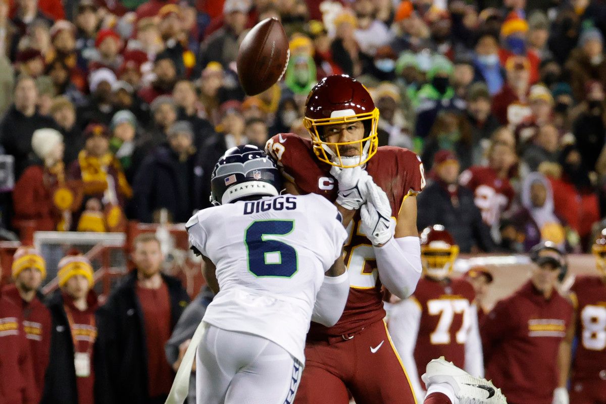 Seattle Seahawks safety Quandre Diggs (6) knocks the ball from Washington Football Team tight end Logan Thomas (82) during the second quarter at FedExField.