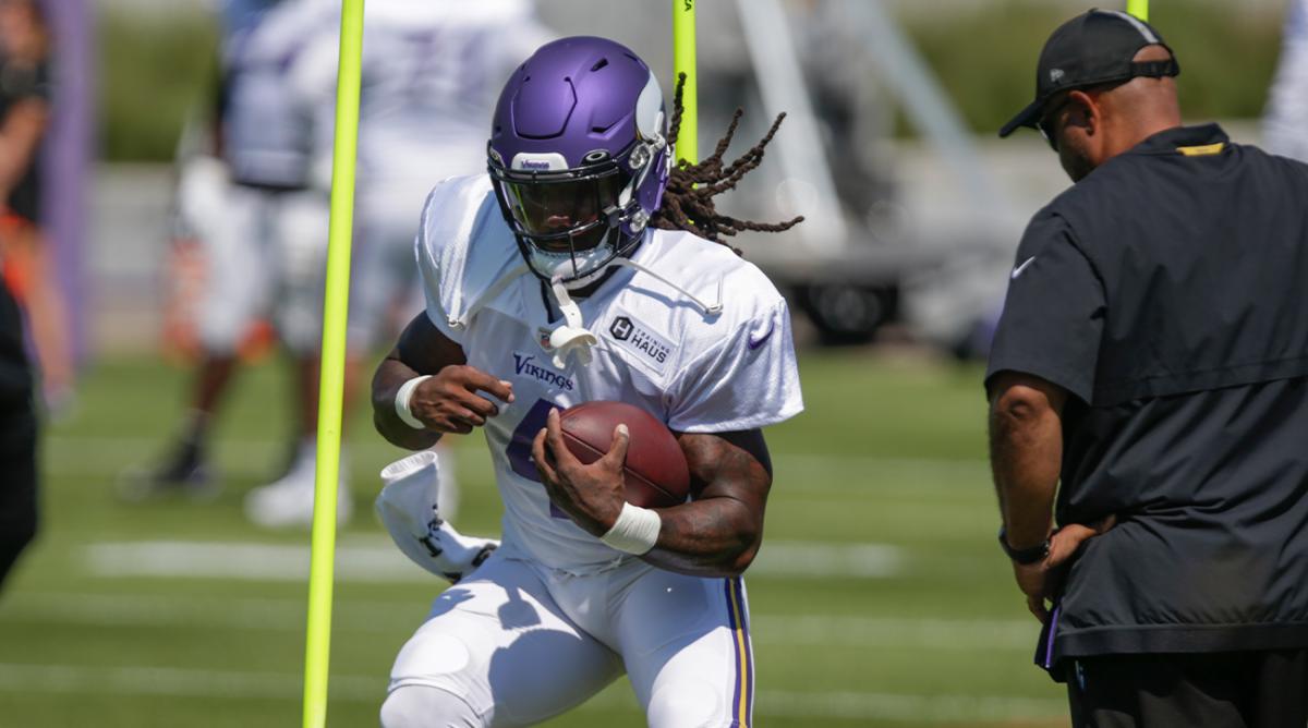 Minnesota Vikings running back Dalvin Cook runs during drills at the NFL football team’s practice facility in Eagan, Minn., Monday, Aug. 1, 2022.