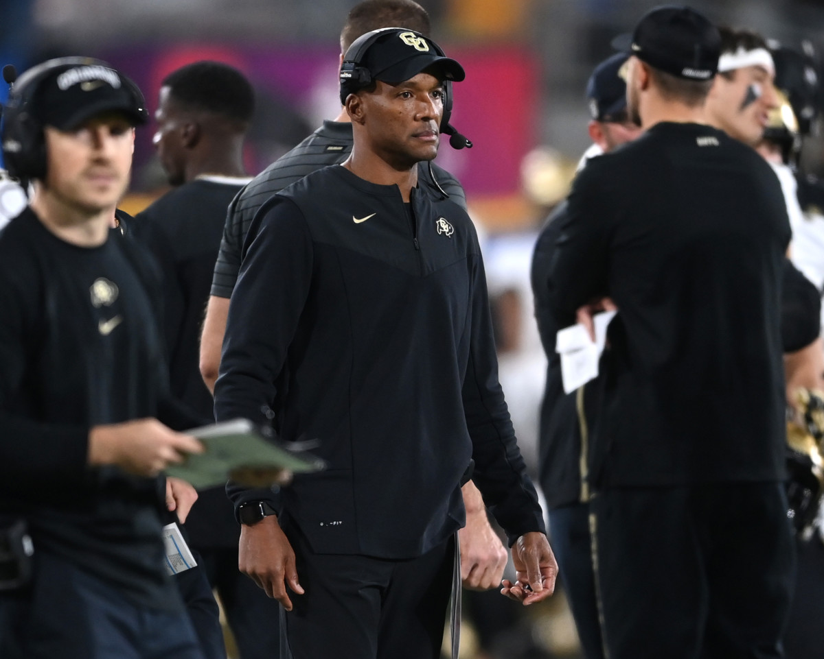USA; Colorado Buffaloes head coach Karl Dorrell (center) looks on during the first half against the UCLA Bruins at Rose Bowl.