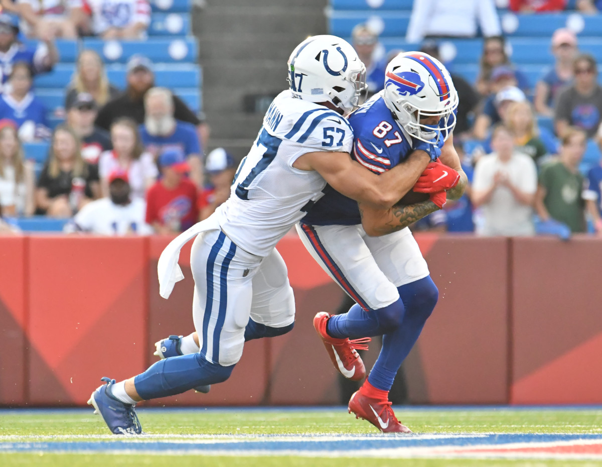 Aug 13, 2022; Orchard Park, New York, USA; Buffalo Bills wide receiver Tanner Gentry (87) is tackled by Indianapolis Colts linebacker JoJo Domann (57) after a catch in the fourth quarter pre-season game at Highmark Stadium.