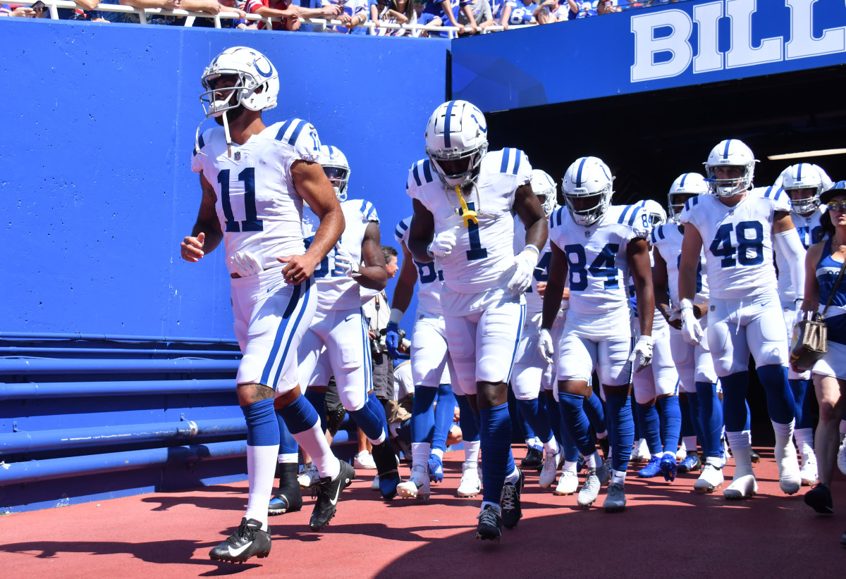 Aug 13, 2022; Orchard Park, New York, USA; Indianapolis Colts wide receiver Michael Pittman Jr. (11) and wide receiver Parris Campbell (1) lead teammates onto the field before a pre-season game against the Buffalo Bills at Highmark Stadium.
