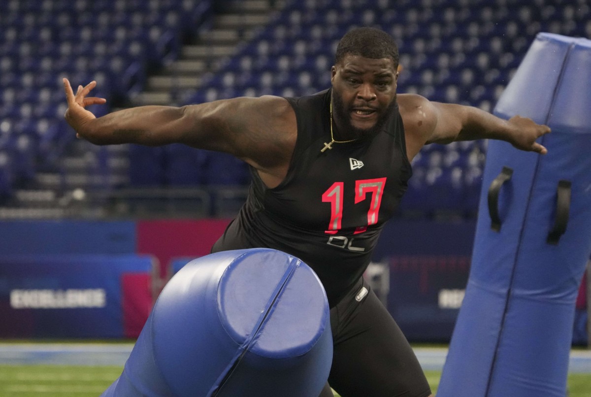 Mar 5, 2022; Indianapolis, IN, USA; Kentucky defensive lineman Marquan Mccall (DL17) goes through drills during the 2022 NFL Scouting Combine at Lucas Oil Stadium. Mandatory Credit: Kirby Lee-USA TODAY Sports