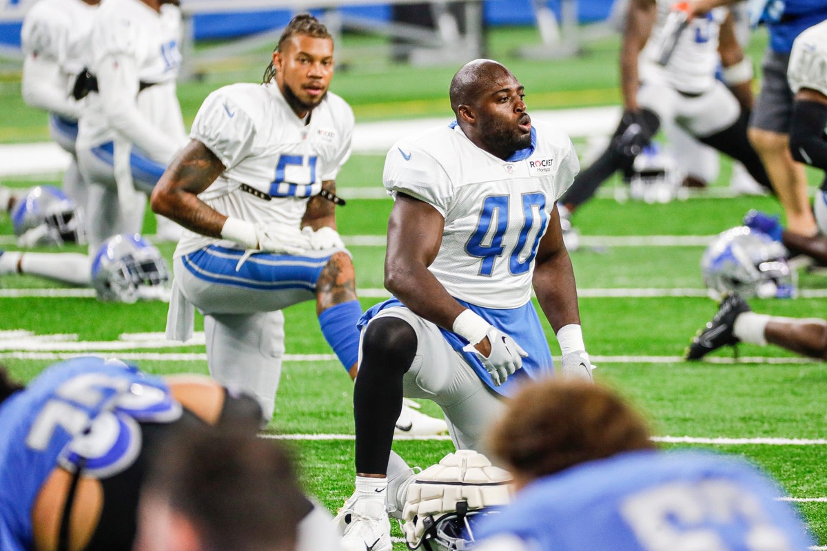 Lions linebacker Jarrad Davis warms up during open practice at Family Fest at Ford Field on Saturday, August 6, 2022.