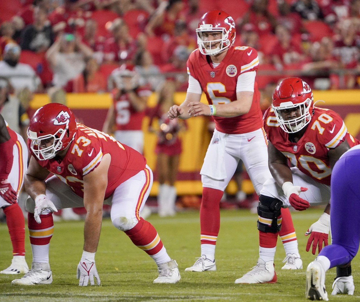 Aug 27, 2021; Kansas City, Missouri, USA; Kansas City Chiefs offensive guard Nick Allegretti (73) and offensive tackle Prince Tega Wanogho (70) on the line of scrimmage abasing the Minnesota Vikings during the game at GEHA Field at Arrowhead Stadium. Mandatory Credit: Denny Medley-USA TODAY Sports