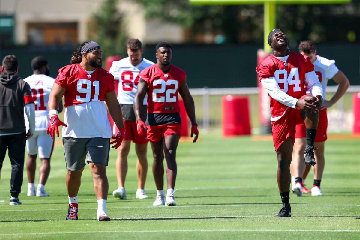 May 31, 2022; Tampa, FL, USA; Tampa Bay Buccaneers defensive lineman Benning Potoa'e (91) and defensive lineman Willington Previlon (94) participate in organized team activities at AdventHealth Training Center Mandatory Credit: Nathan Ray Seebeck-USA TODAY Sports