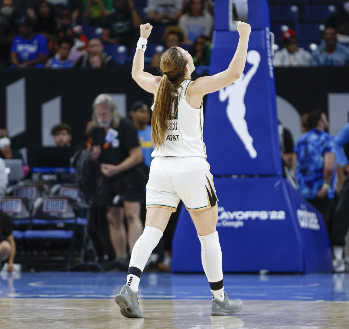 New York Liberty guard Sabrina Ionescu celebrates the victory against the Chicago Sky after Game 1 of the first round of the WNBA playoffs at Wintrust Arena.