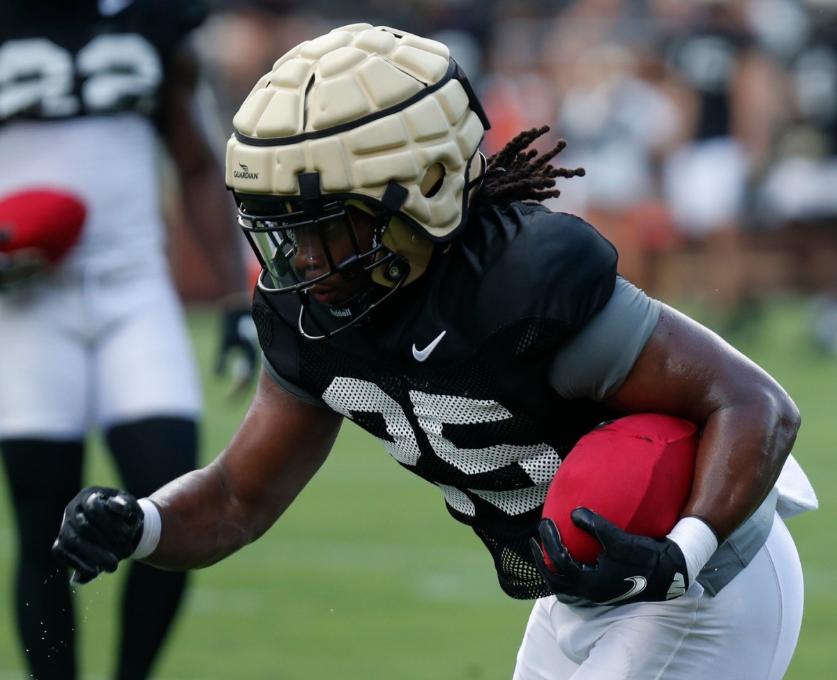 Purdue Boilermaker Kobe Lewis (25) runs a drill during a practice, Friday, Aug. 5, 2022, at Ross-Ade Stadium in West Lafayette, Ind.