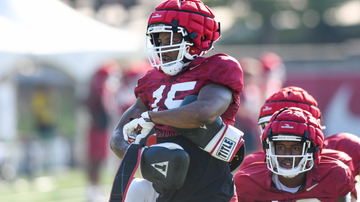 Arkansas Razorbacks safety Simeon Blair struggled a little putting on the boxing gloves for Thursday's practice on the outdoor grass field and the football center, but he figured it out.