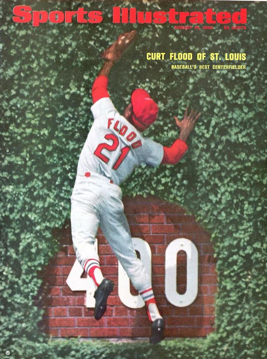 1968 Sports Illustrated cover featuring Curt Flood making a leaping catch