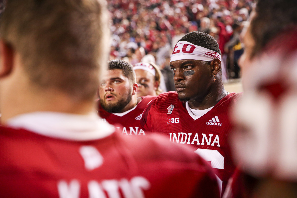 Matthew Bedford stands on the sideline in deep focus as he prepares to take the field.