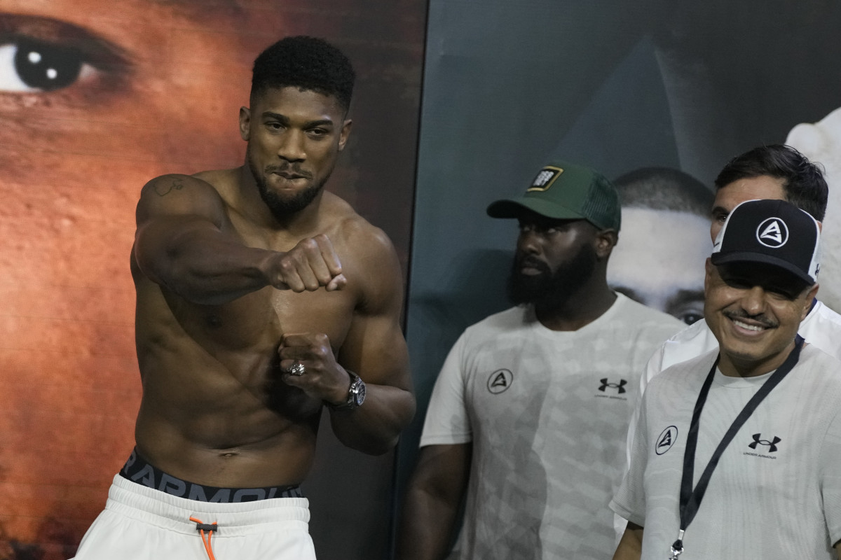 Heavyweight boxer Great Britain’s Anthony Joshua (left) gestures during the weigh-in at King Abdullah Sports City in Jeddah, Saudi Arabia.