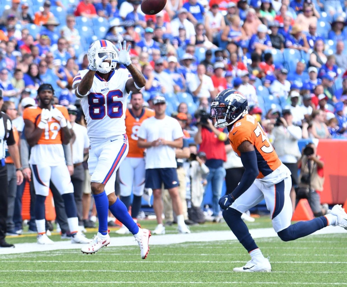 Buffalo Bills wide receiver Tavon Austin (86) makes a catch in front of Denver Broncos cornerback Bless Austin (38) in the third quarter of a pre-season game at Highmark Stadium.