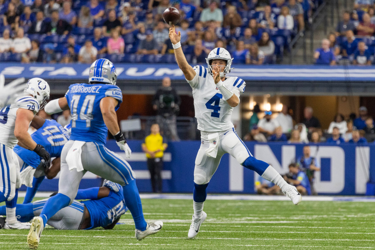 Aug 20, 2022; Indianapolis, Indiana, USA; Indianapolis Colts quarterback Sam Ehlinger (4) passes the ball in the second quarter against the Detroit Lions at Lucas Oil Stadium.