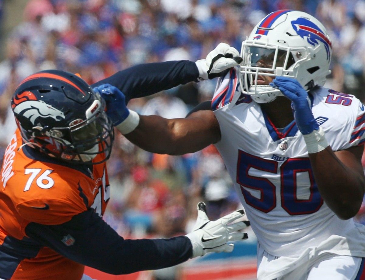 Bills edge Greg Rousseau (50), right, pushes aside Denver tackle Calvin Anderson (76) in the first half during the Bills preseason game against Denver Saturday, Aug. 20, 2022 at Highmark Stadium. Sd 082022 Bills 87 Spts