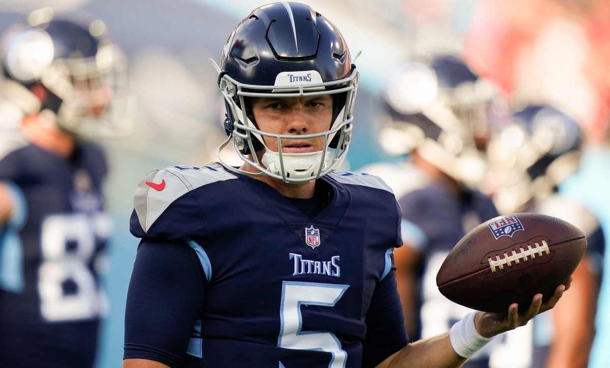 Tennessee Titans quarterback Logan Woodside (5) warms up before facing the Tampa Bay Buccaneers in a preseason game at Nissan Stadium Saturday, Aug. 20, 2022, in Nashville, Tenn.
