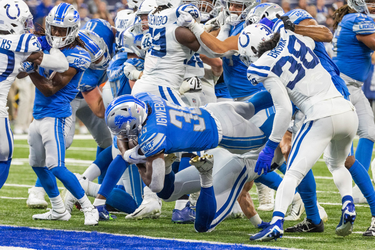 Aug 20, 2022; Indianapolis, Indiana, USA; Detroit Lions running back Godwin Igwebuike (35) dives into the endzone for a touchdown in the second half against the Indianapolis Colts at Lucas Oil Stadium. Mandatory Credit: Trevor Ruszkowski-USA TODAY Sports