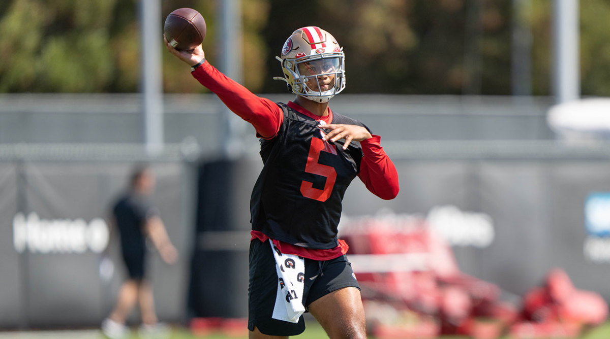 Trey Lance throws a pass at 49ers training camp