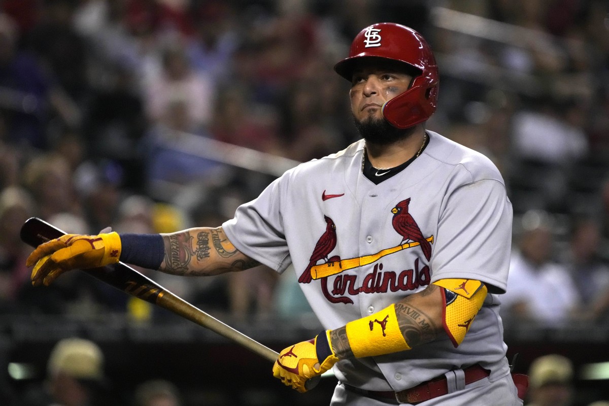St. Louis Cardinals catcher Yadier Molina (4) reacts after missing a pitch against the Arizona Diamondbacks in the fifth inning at Chase Field. (Rick Scuteri-USA TODAY Sports)