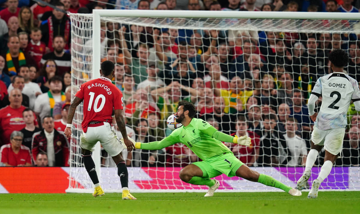 Marcus Rashford pictured scoring for Manchester United in their 2-1 win over Liverpool in August 2022