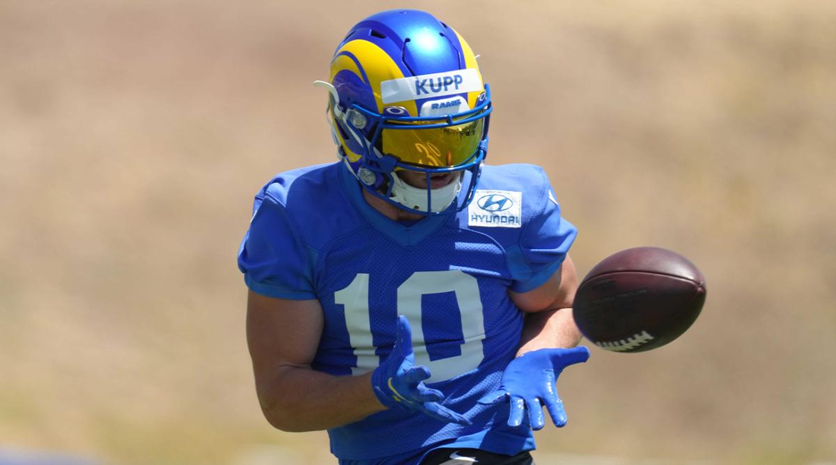 May 23, 2022; Thousand Oaks, CA, USA; Los Angeles Rams receiver Cooper Kupp (10) catches the ball during organized team activities at California Lutheran University.