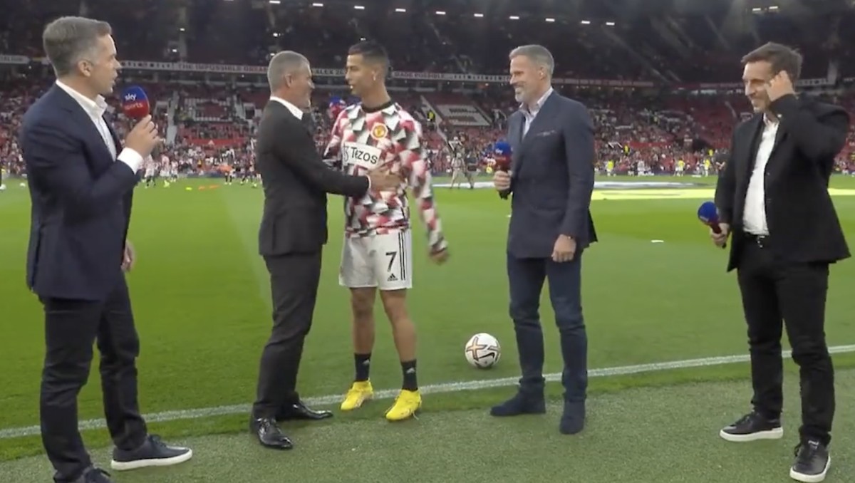 Jamie Carragher (second right) pictured smiling awkwardly after being ignored by Manchester United forward Cristiano Ronaldo (center) before a game at Old Trafford in August 2022
