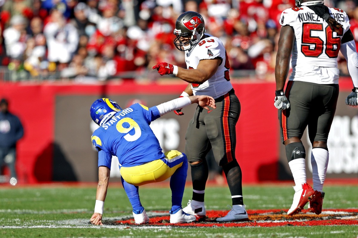Jan 23, 2022; Tampa, Florida, USA; Tampa Bay Buccaneers defensive end Ndamukong Suh (93) taunts Los Angeles Rams quarterback Matthew Stafford (9) during the first half in a NFC Divisional playoff football game at Raymond James Stadium. Mandatory Credit: Nathan Ray Seebeck-USA TODAY Sports