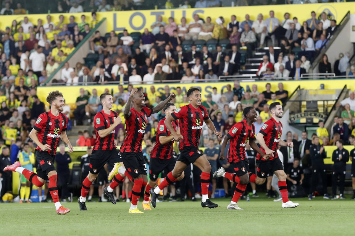Bournemouth's players pictured celebrating after beating Norwich City in a penalty shootout in the second round of the EFL Cup in August 2022