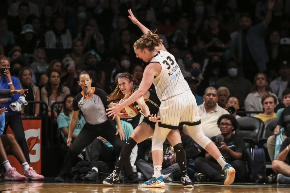 New York Liberty guard Sabrina Ionescu (20) is guarded by Chicago Sky forward Emma Meesseman (33) in the fourth quarter at Barclays Center.