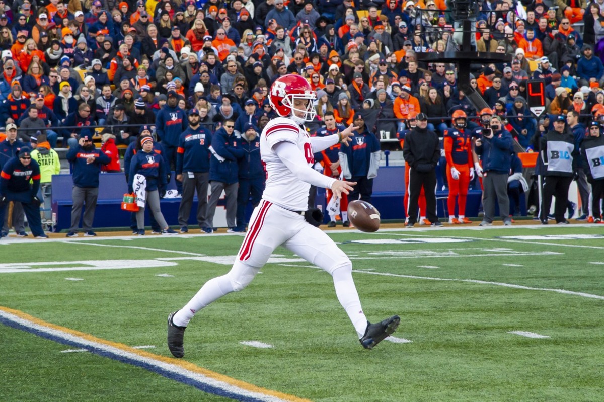 Nov 2, 2019; Champaign, IL, USA; Rutgers Scarlet Knights punter Adam Korsak (94) punts the ball during the first half against the Illinois Fighting Illini at Memorial Stadium.